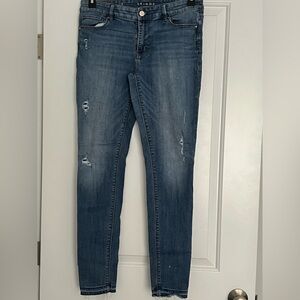 White House Black Market skinny ankle jeans.